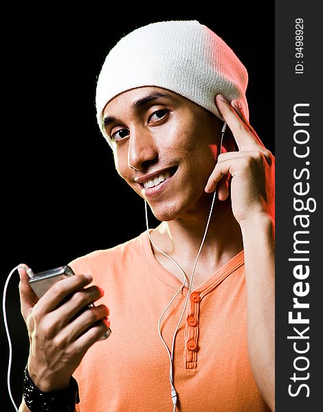 Asian Male Listening To Music