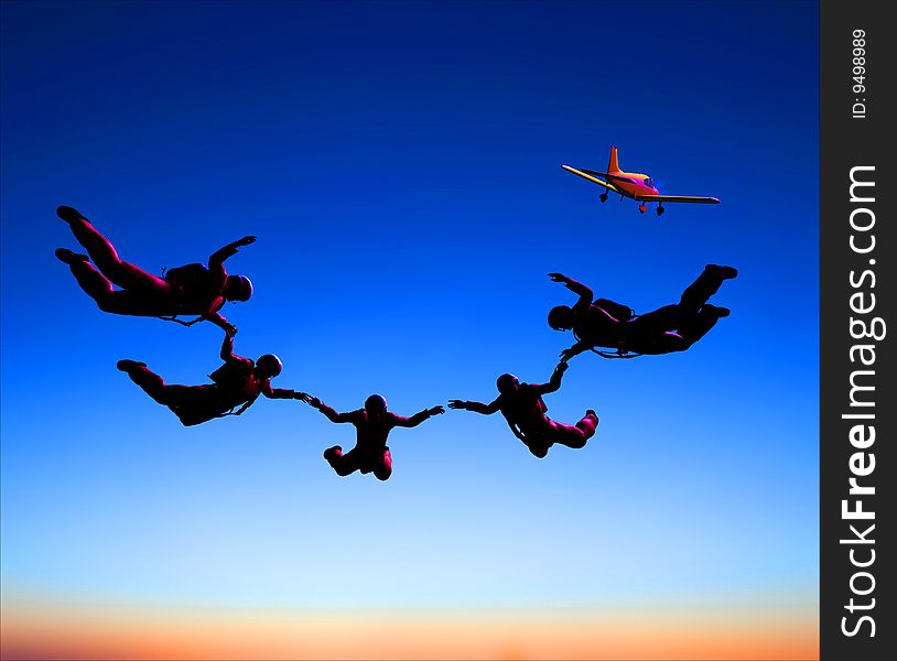Sportsmen-parashutist soaring in sky