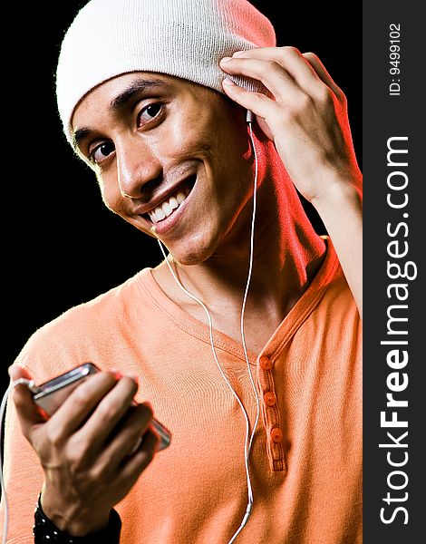 Asian Male Listening To Music