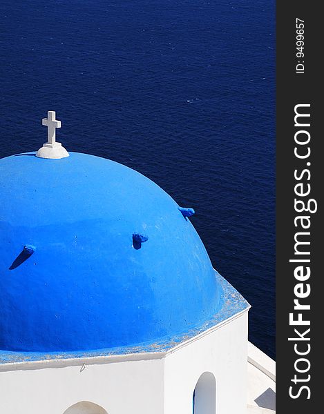 A blue church face to aegean sea. A blue church face to aegean sea