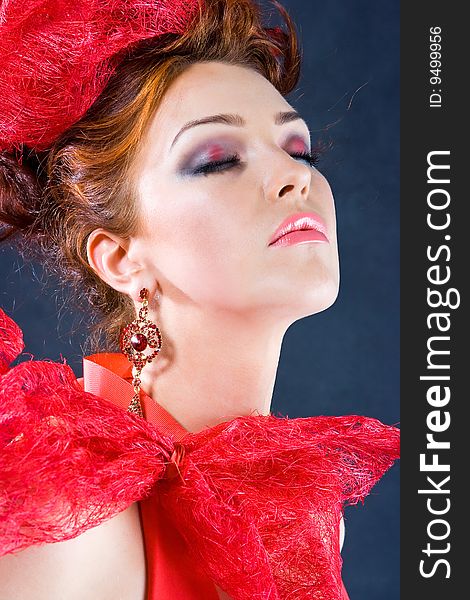 Red haired girl closed her eyes in this studio shot. Red haired girl closed her eyes in this studio shot