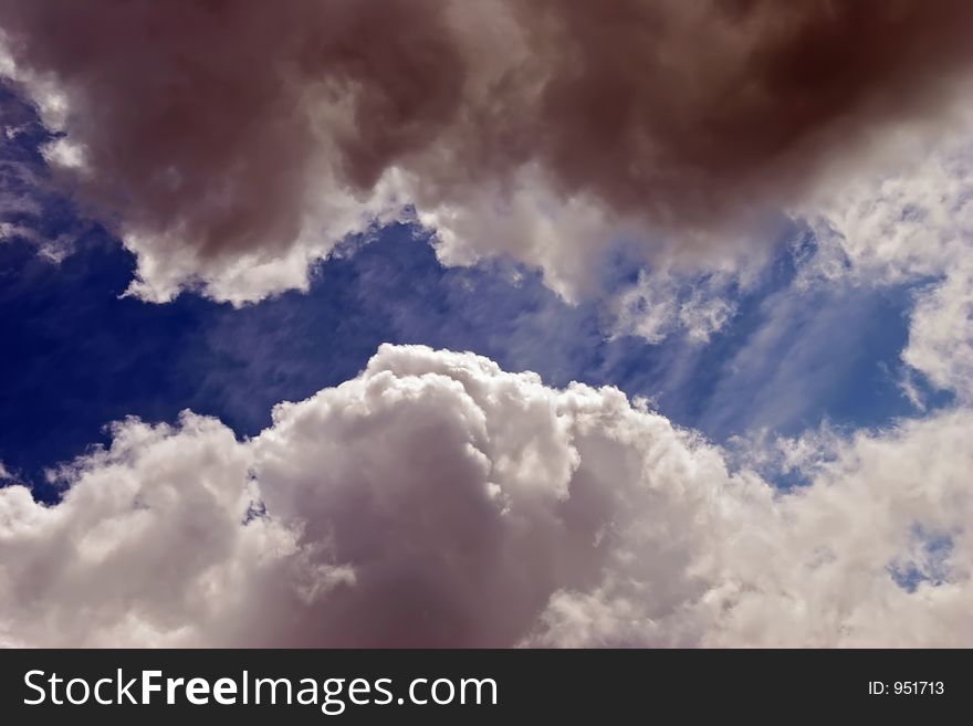 A break in the clouds revealing a blue ribbon of sky. A break in the clouds revealing a blue ribbon of sky.