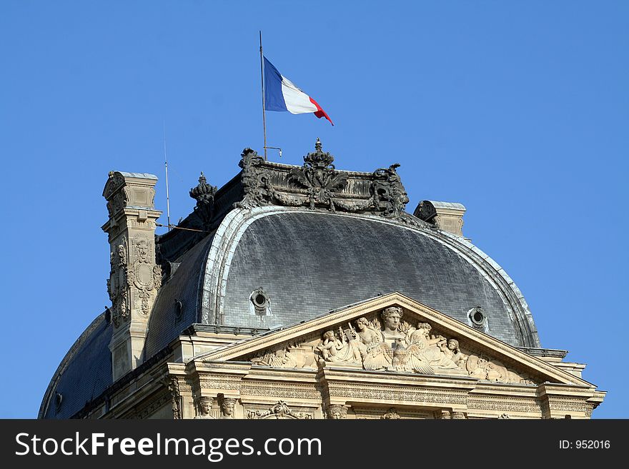 French building roof with a flag on top, Paris, France