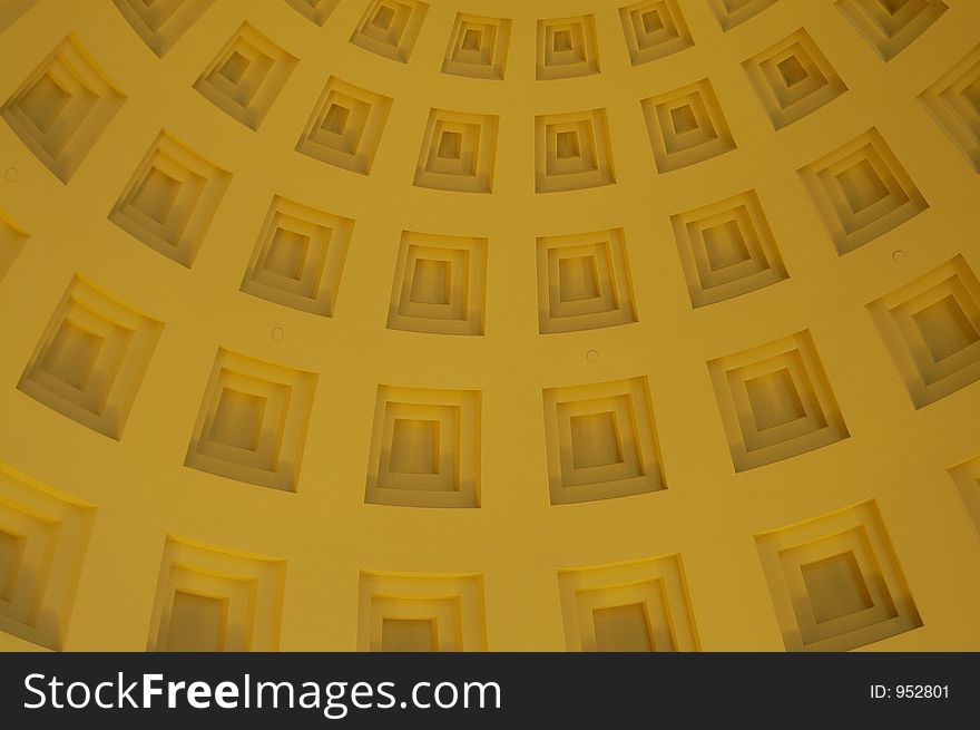 A hotel ceiling with a square pattern. A hotel ceiling with a square pattern