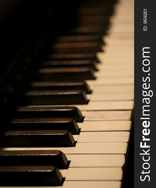 Close up of old piano keyboard