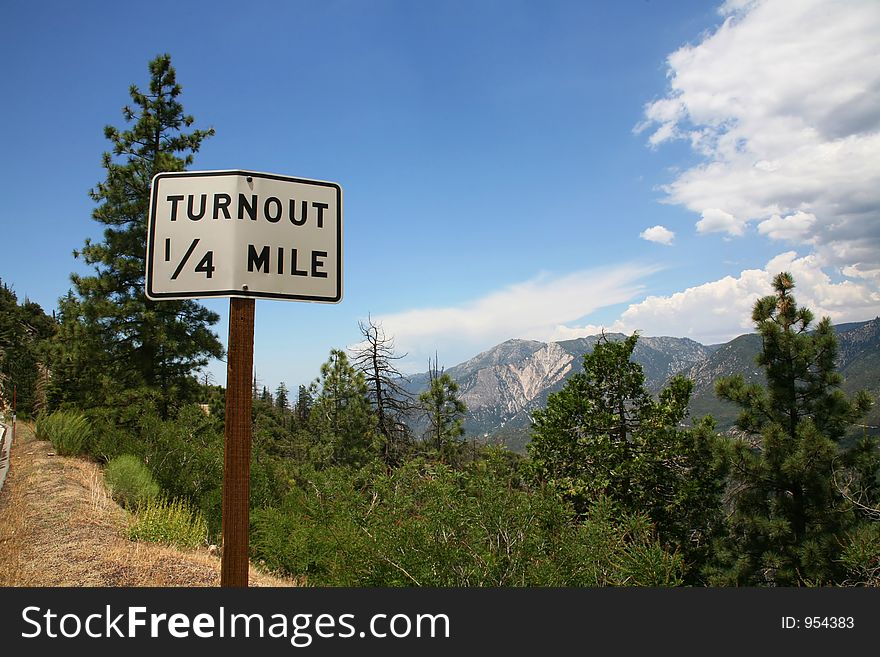 Turnout Sign Alongside Mountainside. Turnout Sign Alongside Mountainside