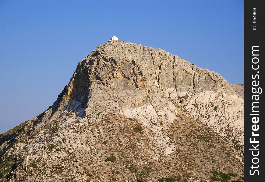 Small church on rock, island Naxos, Greece