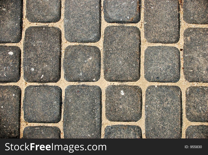 Grey brick background. Grey brick background