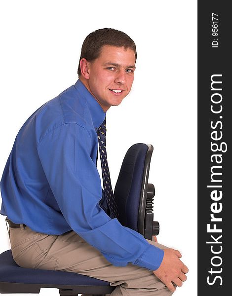 Man sitting on office chair. Man sitting on office chair