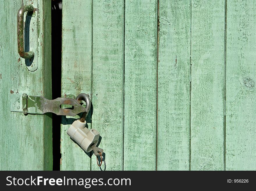 Closed green door background. Closed green door background