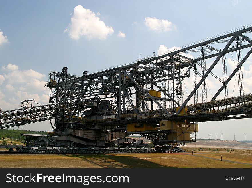 Enormous coal conveyor bridge in the East German coal open mining. Enormous coal conveyor bridge in the East German coal open mining