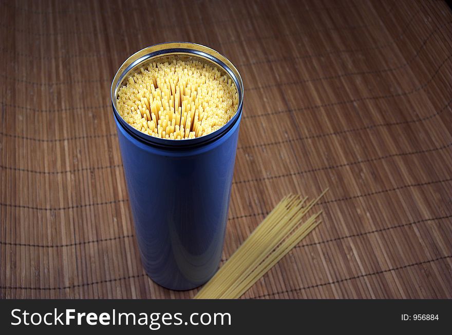 Spaghetti in blue container