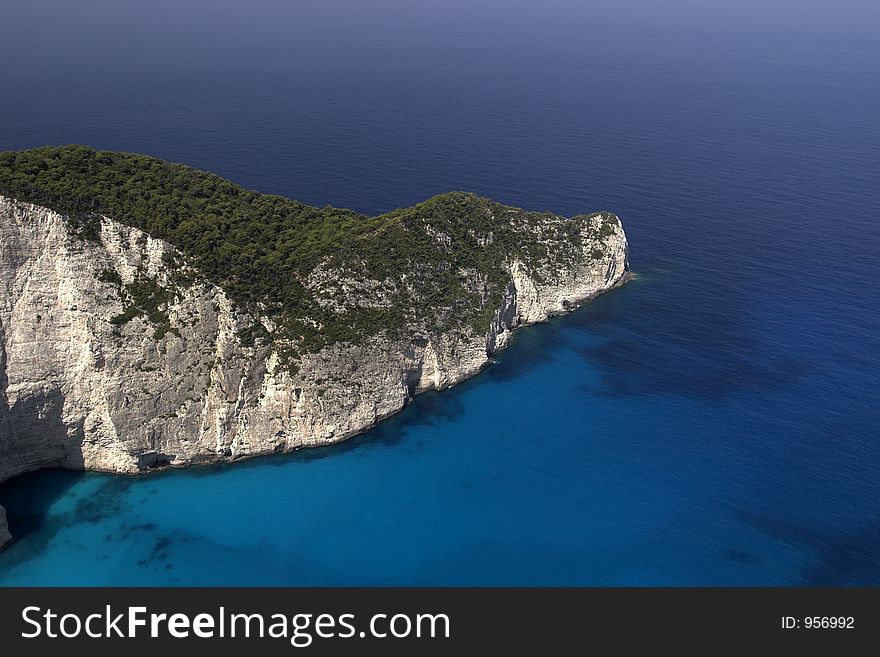 The mountainous coastline at the Greek Isle of Zakynthos also known as Zante, near the shipwreck bay. The mountainous coastline at the Greek Isle of Zakynthos also known as Zante, near the shipwreck bay.