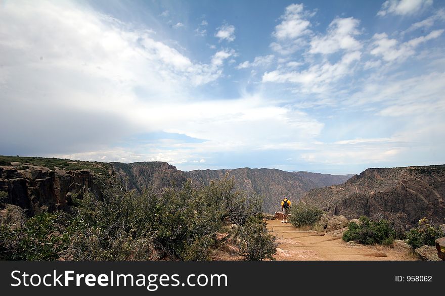 Man hiking on trail. Man hiking on trail