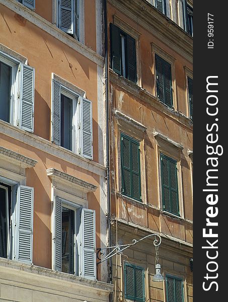 Detail of two old apartment buildings in Rome, Italy. Detail of two old apartment buildings in Rome, Italy