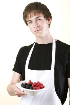 Young Man Holding A Bowl Of Fruit Royalty Free Stock Photos Young Man Holding A Bowl Of Fruit Royalty Free Stock Photos