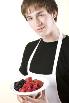 Young Man Holding Bowl Of Berries Royalty Free Stock Images Young Man Holding Bowl Of Berries Royalty Free Stock Images