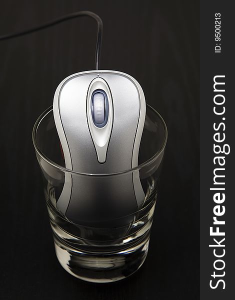 Computer Mouse In A Glass