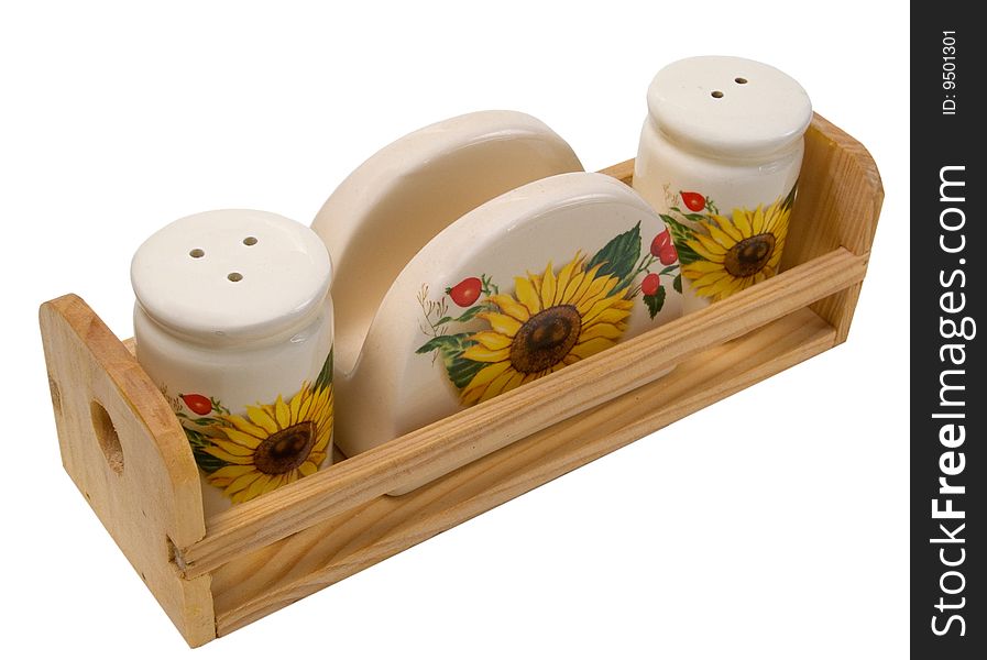 Handmade salt shaker, pepper shaker and napkin holder on white background