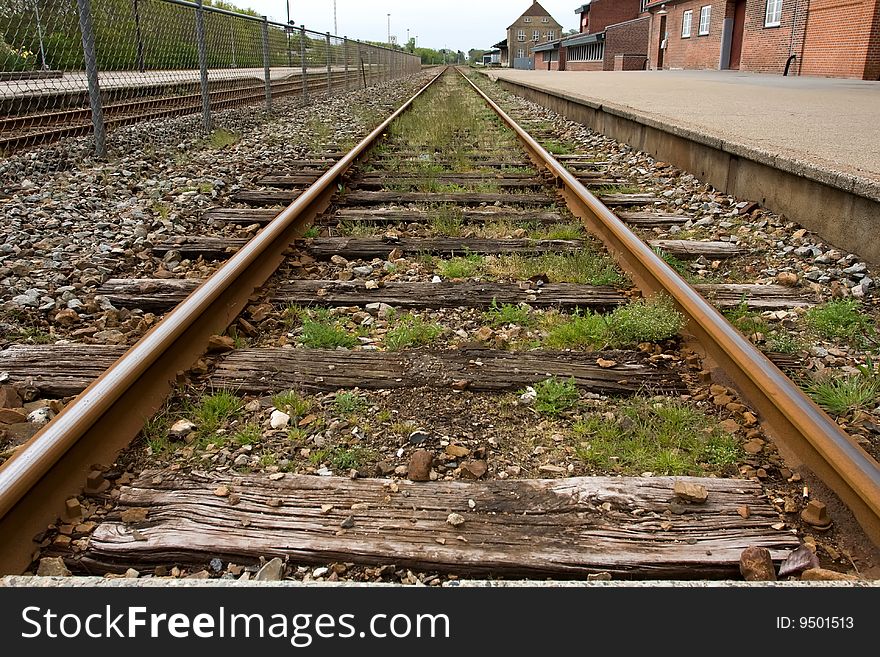 Railtrack starting form the station to the horizon.