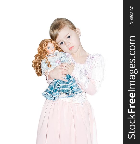 The girl with a doll on a white background. The girl with a doll on a white background.