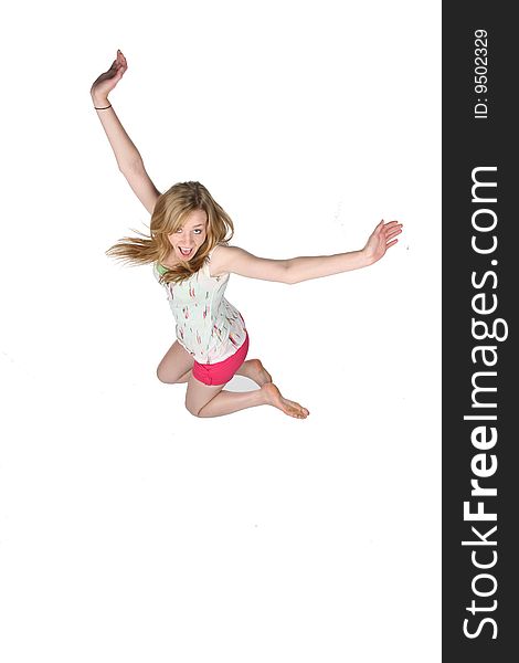 Pretty Young Woman Jumping For Joy And Fun