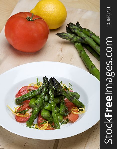 Plate Of Asparagus And Tomato Salad
