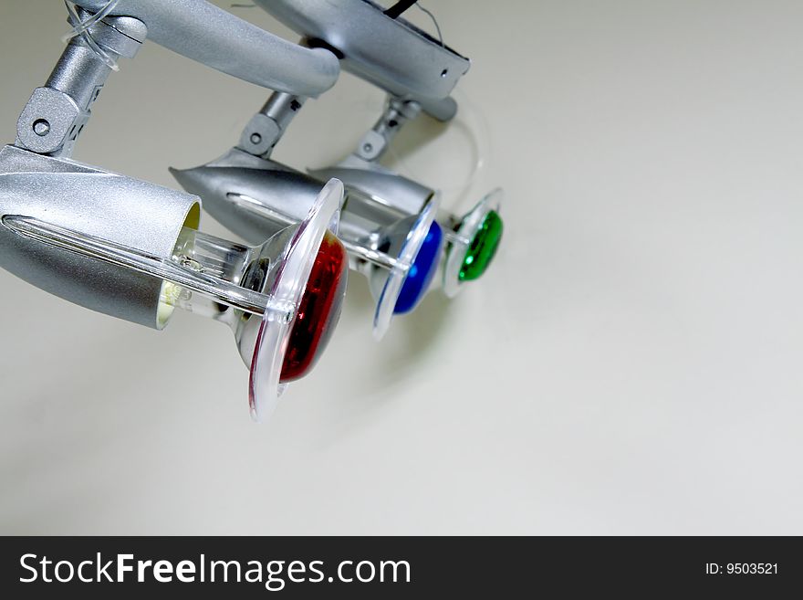 Three colored hanging lights: green blue and red. Three colored hanging lights: green blue and red.