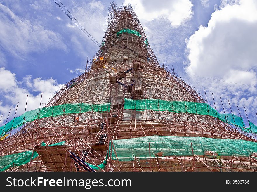 The repairing of old and famous pagoda in Nakorn Pathom province, Thailand. The repairing of old and famous pagoda in Nakorn Pathom province, Thailand
