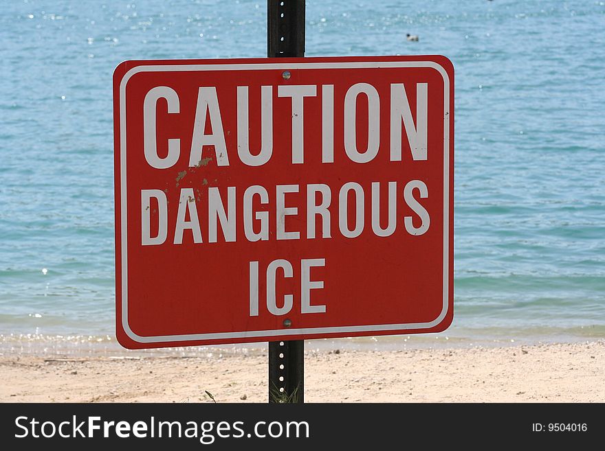 Image of a caution sign warning of dangerous ice