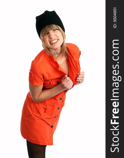 Glamor girl in a orange dress isolated on white posing in a studio