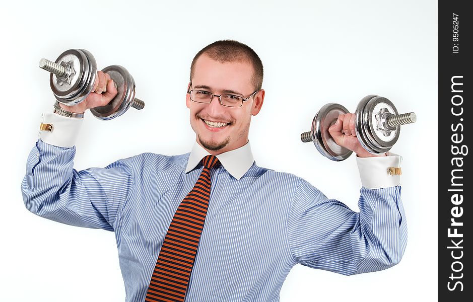 Handsome businessman exercising with dumbbells. Isolated