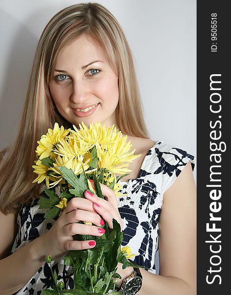 Happy young smiling woman with bunch of flowers. Happy young smiling woman with bunch of flowers