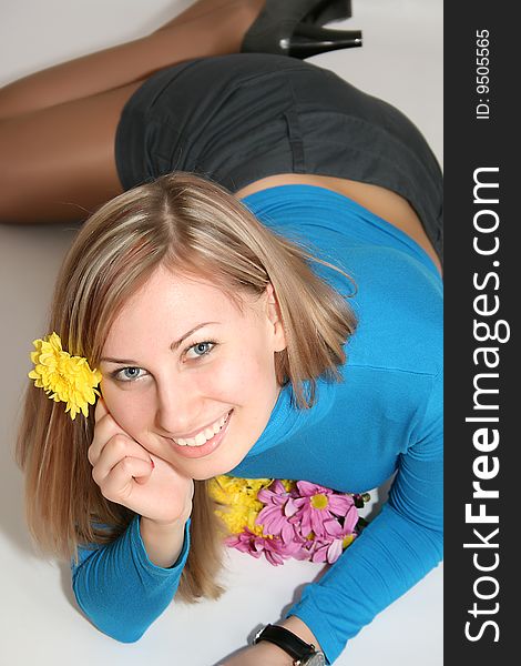 Happy young smiling woman with bunch of flowers. Happy young smiling woman with bunch of flowers