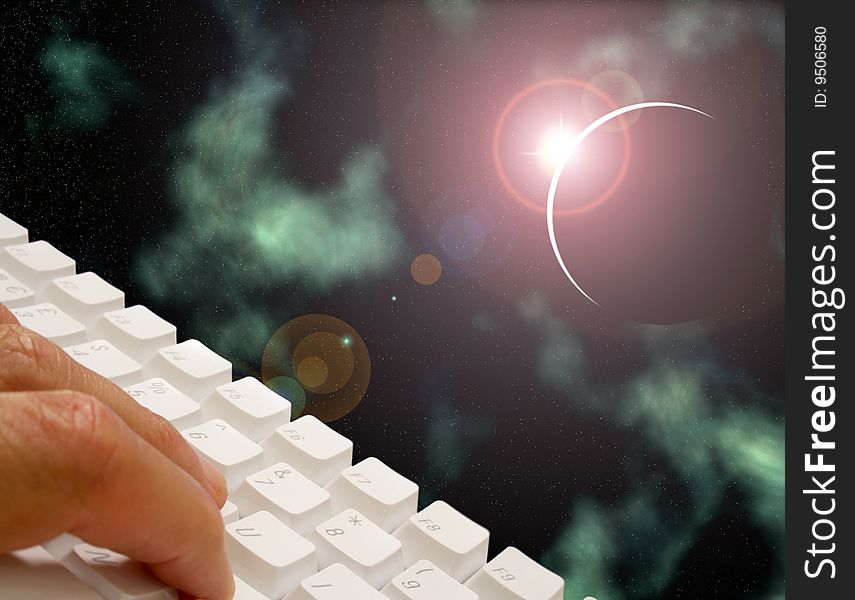 Male using keyboard overlaid over space scene. Male using keyboard overlaid over space scene