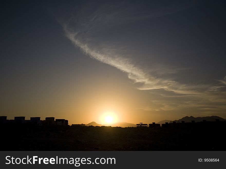 Orange sunset in the mountains. Egypt, Cairo