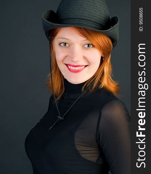 red young woman wearing a cowboy hat. red young woman wearing a cowboy hat