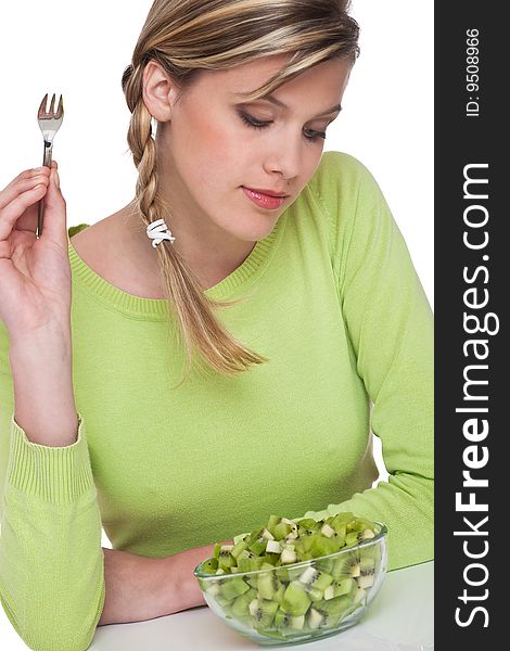 Woman with bowl of kiwi  on white background. Woman with bowl of kiwi  on white background