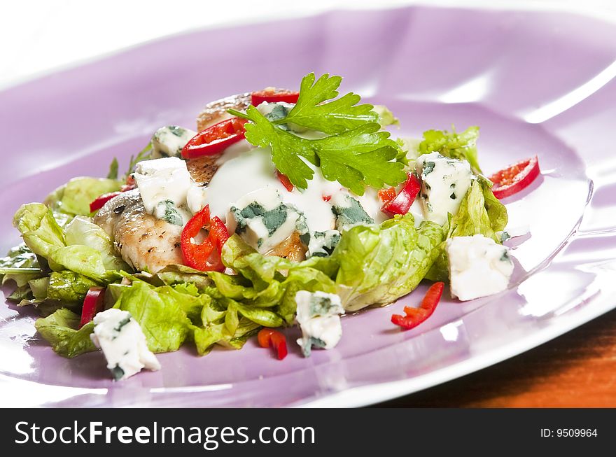 Grilled chicken salad with blue cheese