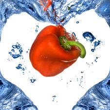 Red Pepper With Shape Of Heart From Blue Water Royalty Free Stock Photo