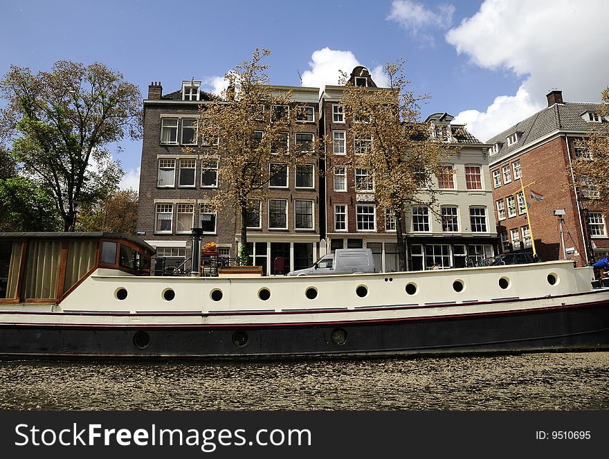 Building and boat on canal