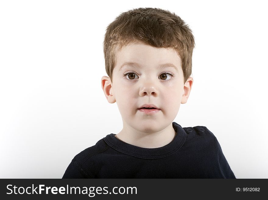 Head and shoulders portrait of a young boy of preschool age