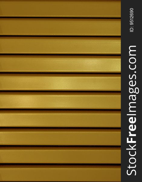 Yellow stripes texture of metal window shield.