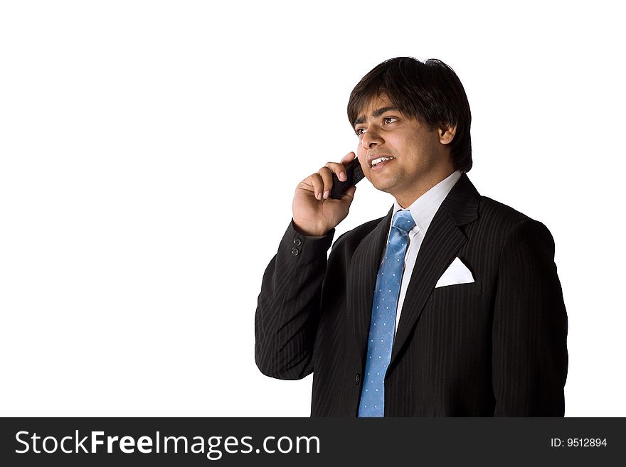 Portrait of a happy  businessman  talking at cell phone. Portrait of a happy  businessman  talking at cell phone