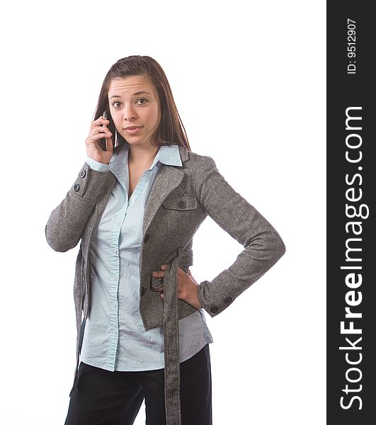 Business woman on a cell phone isolated on white