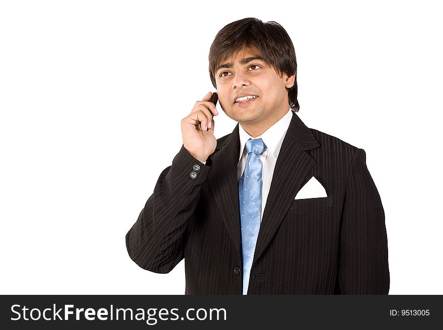 Portrait of a happy  businessman  talking at cell phone. Portrait of a happy  businessman  talking at cell phone