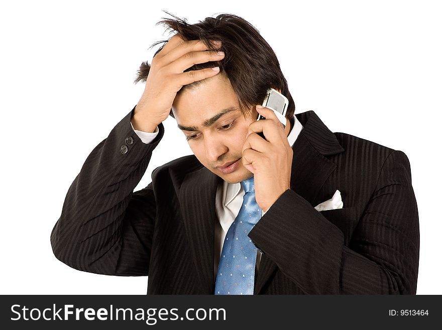 Businessman in a suit gestures with a headache. Businessman in a suit gestures with a headache