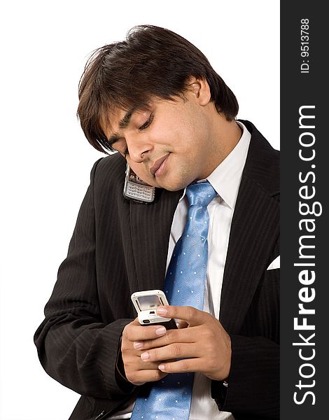 Portrait of a happy  businessman  talking at cell phone. Portrait of a happy  businessman  talking at cell phone