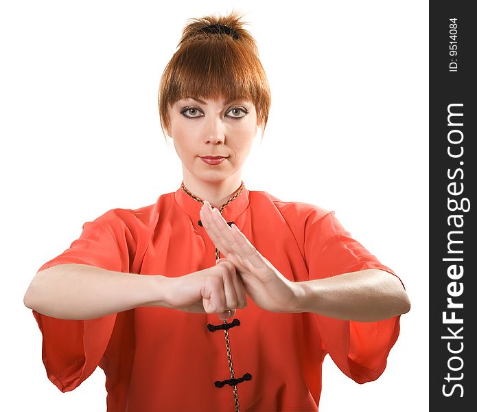 Young woman makes chinese greeting gesture isolated with clipping path on white background
