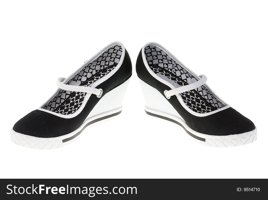 Girls' shoes isolated on a white background. Girls' shoes isolated on a white background.